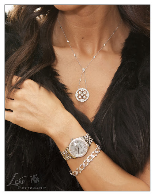 diamond necklace and rolex watch
