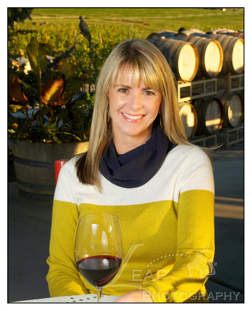 Ilene sitting outside on the patio of an Idaho Winery