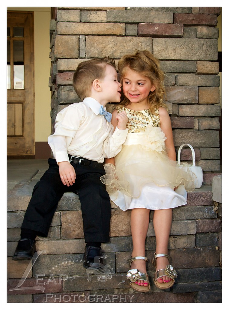 ring bearer kissing flower girl