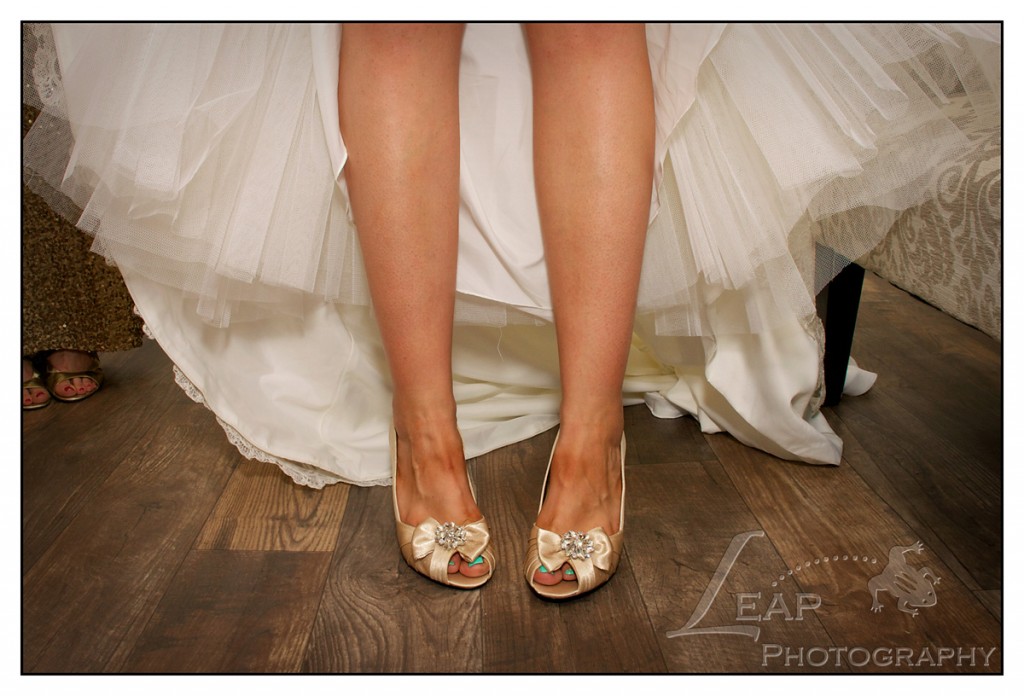 Brides shoes & bottom of wedding dress